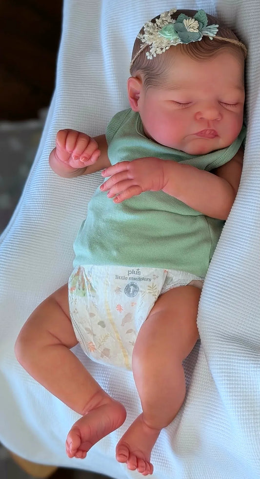 Muñeca Reborn Realista Bruna niña 49cm y 1.700kg + Pack Premium
