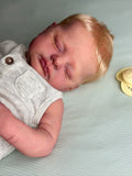 Muñeco Reborn Realista Luan niño 50cm y 1.700kg + Pack Premium