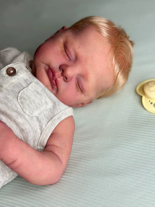 Muñeco Reborn Realista Luan niño 50cm y 1.700kg + Pack Premium