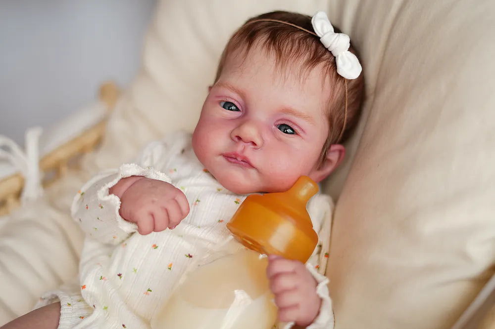 Muñeca Reborn Realista Emma niña 49cm y 1.700kg + Pack Premium