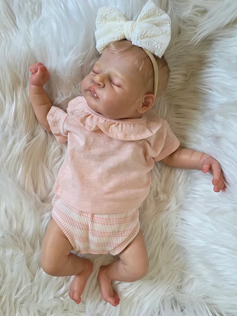 Muñeca Reborn Realista Emilía niña 49cm y 1.700kg + Pack Premium