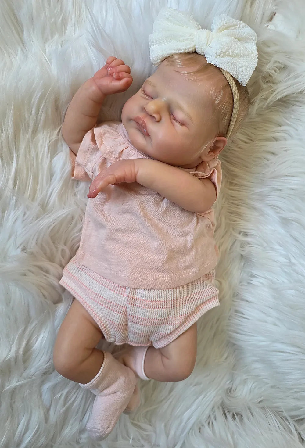 Muñeca Reborn Realista Emilía niña 49cm y 1.700kg + Pack Premium