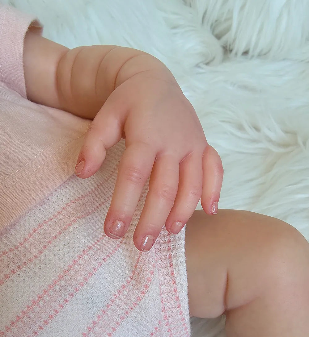 Muñeca Reborn Realista Emilía niña 49cm y 1.700kg + Pack Premium