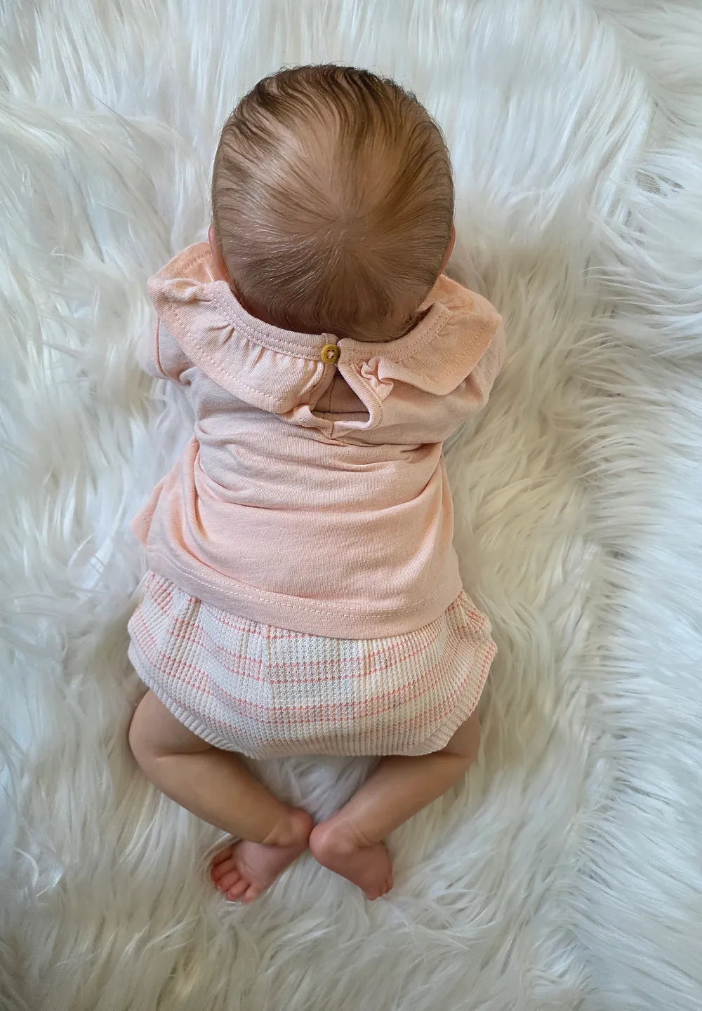 Muñeca Reborn Realista Emilía niña 49cm y 1.700kg + Pack Premium