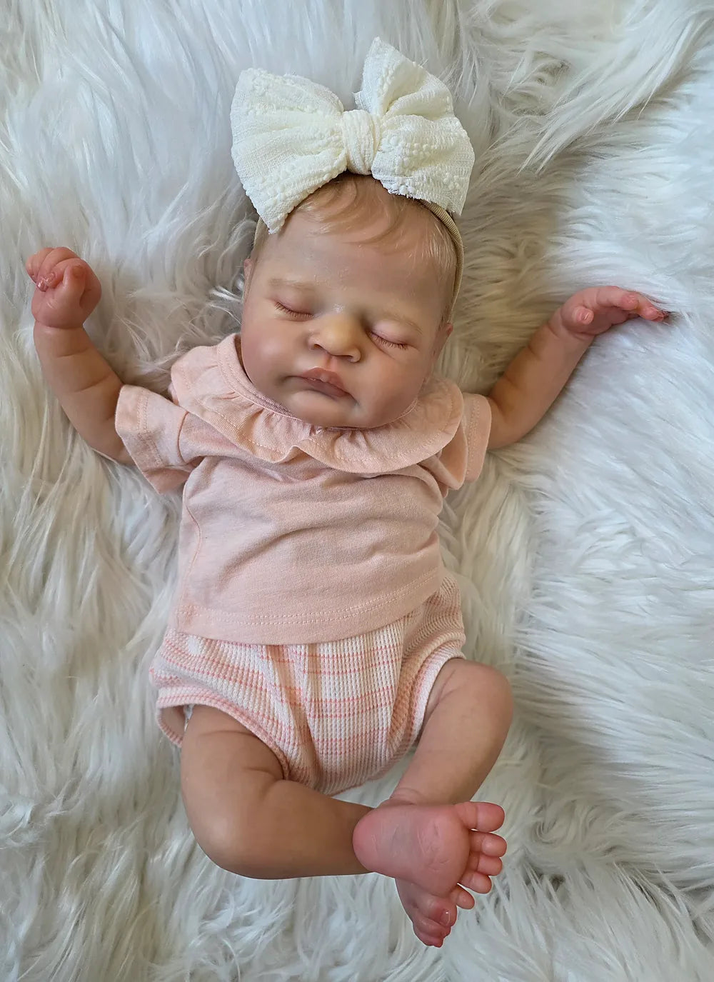 Muñeca Reborn Realista Emilía niña 49cm y 1.700kg + Pack Premium