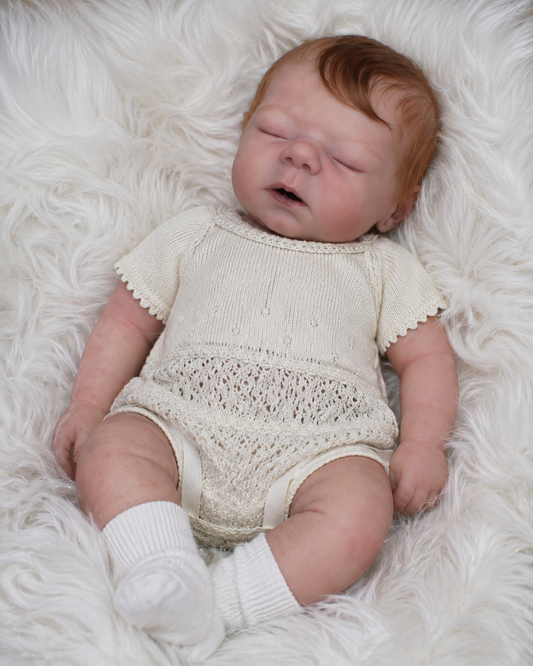 Muñeca Reborn Realista Isabella niña 44cm y 1.400kg + Pack Premium